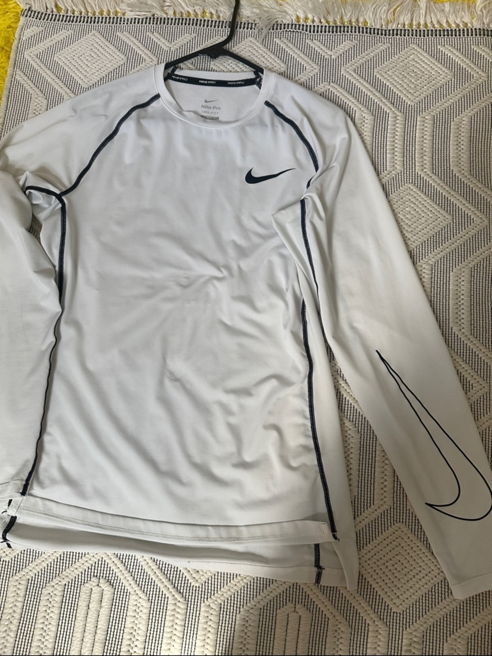 Nike White Long-Sleeve Athletic Top with Navy Swoosh